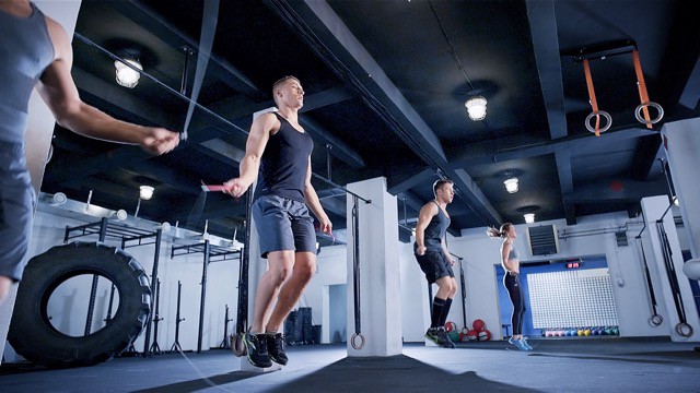 A group of people warmed up by jumping rope